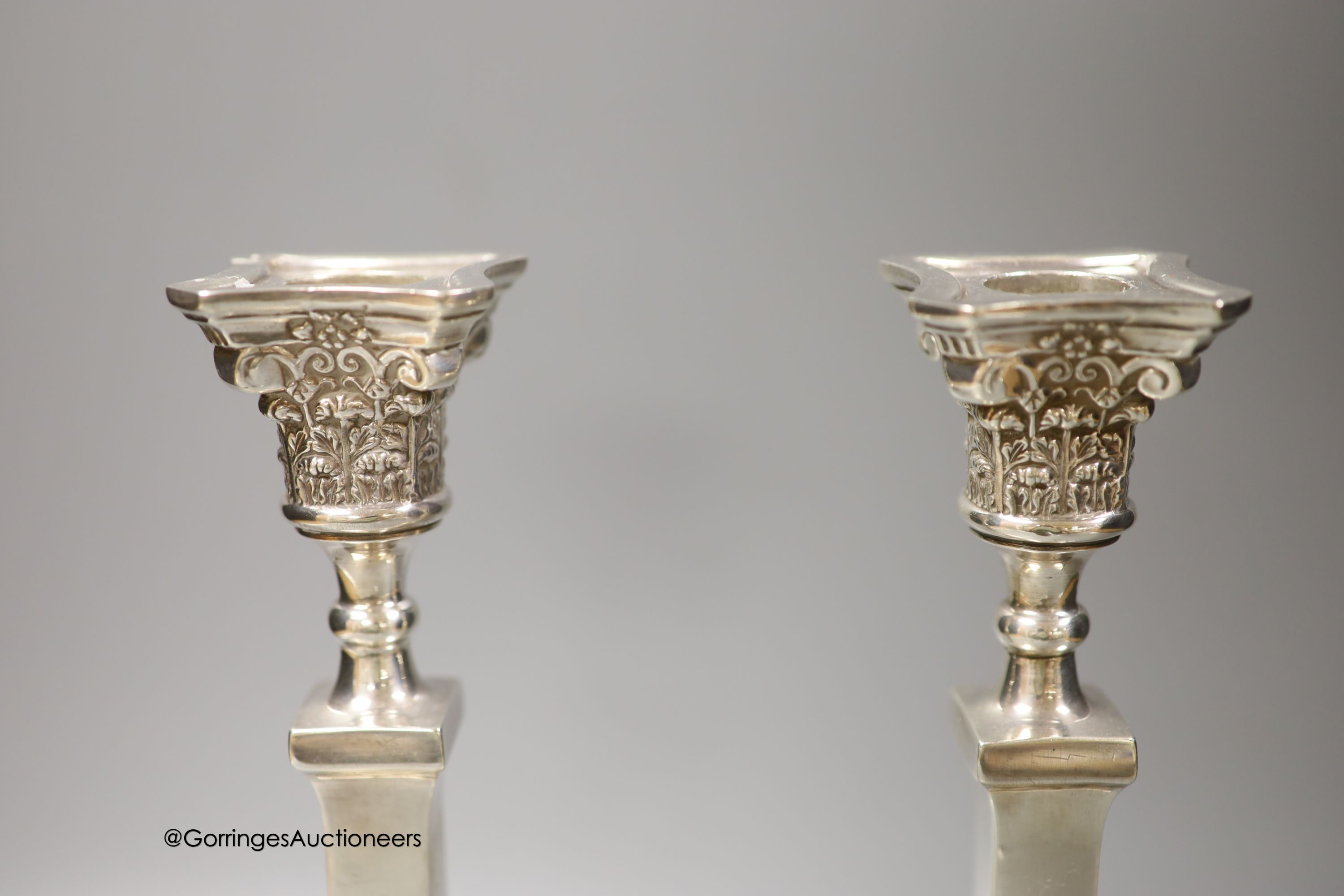 A pair of George V silver candlesticks, Britton, Gould & Co, Birmingham, 1934, 28.4cm, 20.5 oz, lacking sconces.